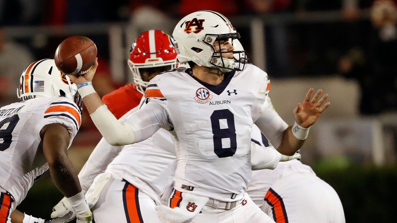 Swift runs for 186 yards, No. 5 Georgia beats Auburn 27-10